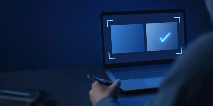 Illustration: a reviewer seen from behind, holding a pen at a laptop that shows two answer panels with a tick on one, for what an AI trainer does