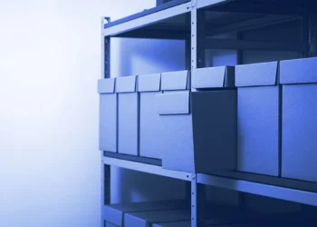 Archive boxes on a shelf with one pulled half out, for accounting AI trainer jobs