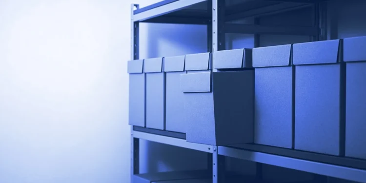 Archive boxes on a shelf with one pulled half out, for accounting AI trainer jobs
